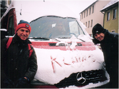 Mark with Rick Lloyd accessing snow on the tour bus
